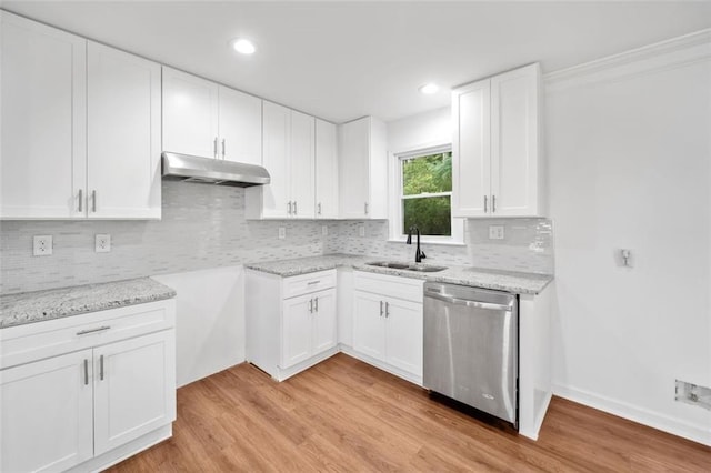 8535 Hiram Acworth Hwy, Dallas, GA 30157 - kitchen with dishwasher, under cabinet range hood, light stone counters, light wood-style floors, and recessed lighting