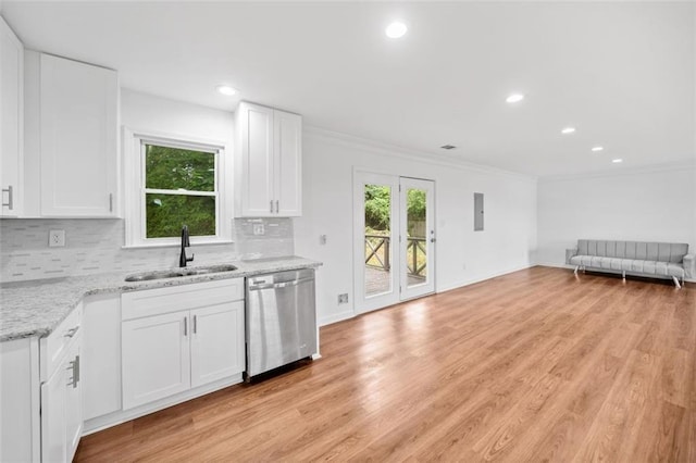 8535 Hiram Acworth Hwy, Dallas, GA 30157 - kitchen with dishwasher, decorative backsplash, open floor plan, light stone counters, and white cabinets
