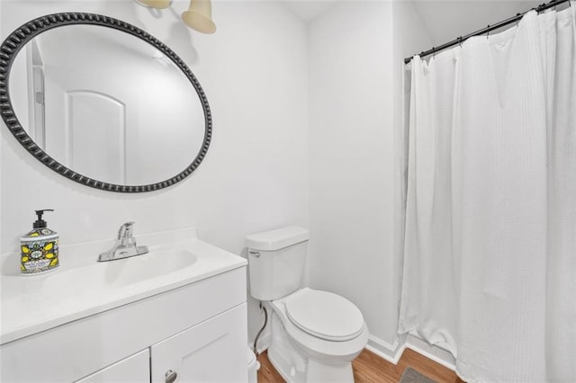 8535 Hiram Acworth Hwy, Dallas, GA 30157 - bathroom with wood finished floors, vanity, and a shower with shower curtain