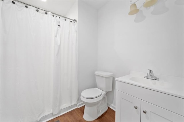 8535 Hiram Acworth Hwy, Dallas, GA 30157 - bathroom with wood finished floors, vanity, and a shower with curtain