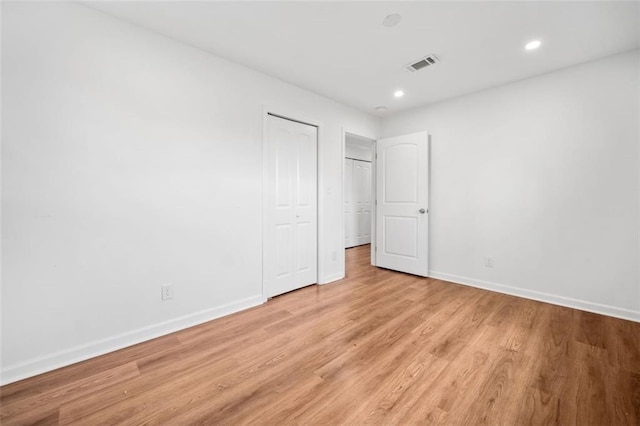 8535 Hiram Acworth Hwy, Dallas, GA 30157 - unfurnished bedroom with light wood-style floors, recessed lighting, and a closet