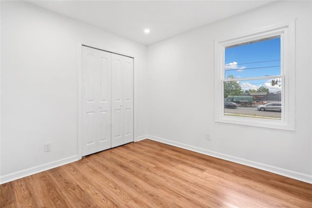 8535 Hiram Acworth Hwy, Dallas, GA 30157 - unfurnished bedroom with light wood-type flooring, a closet, and recessed lighting