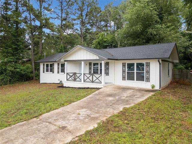 8535 Hiram Acworth Hwy, Dallas, GA 30157 - ranch-style home with a porch, board and batten siding, driveway, a shingled roof, and view of scattered trees