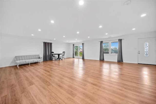 8535 Hiram Acworth Hwy, Dallas, GA 30157 - unfurnished living room featuring crown molding, recessed lighting, and light wood finished floors