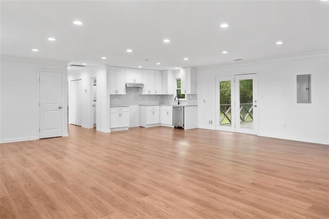 8535 Hiram Acworth Hwy, Dallas, GA 30157 - unfurnished living room with crown molding, electric panel, light wood finished floors, and recessed lighting