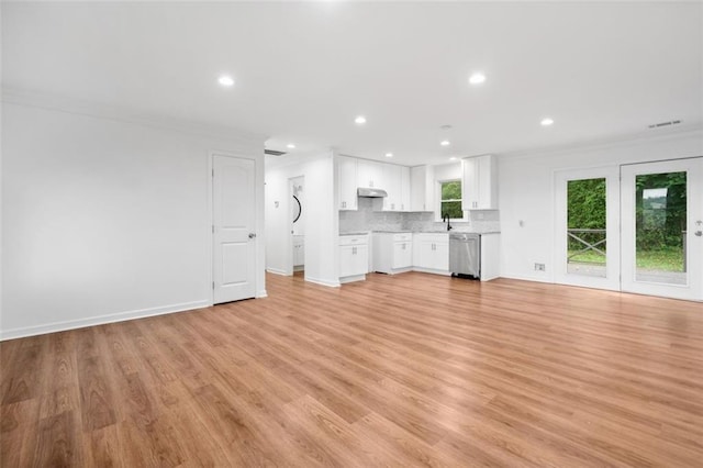 8535 Hiram Acworth Hwy, Dallas, GA 30157 - unfurnished living room featuring recessed lighting, light wood-type flooring, and ornamental molding