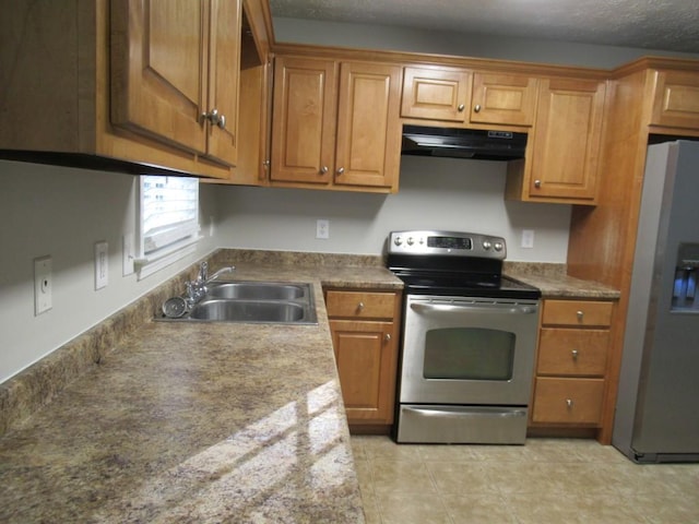 152 Royal Oaks Ln, Dahlonega, GA 30533 - kitchen with appliances with stainless steel finishes, under cabinet range hood, a sink, and brown cabinets