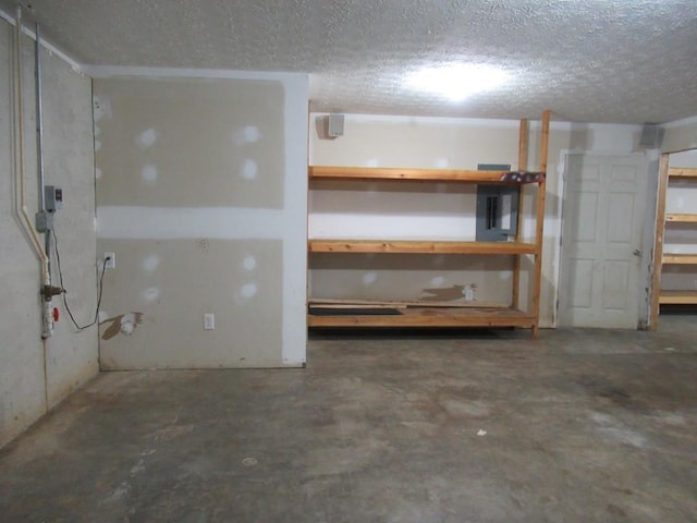 152 Royal Oaks Ln, Dahlonega, GA 30533 - finished below grade area with electric panel and a textured ceiling