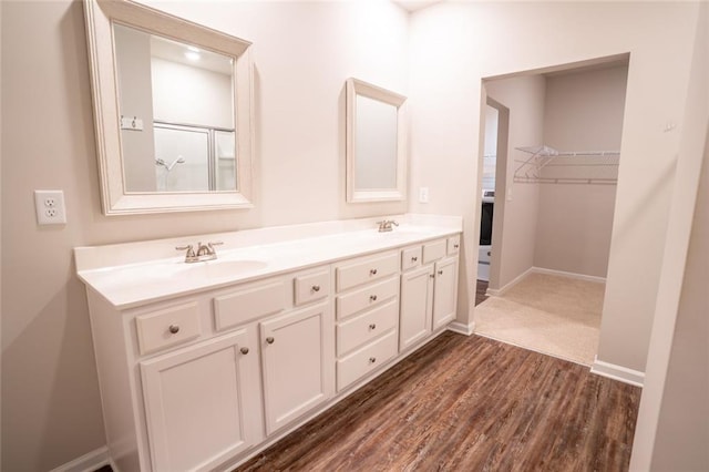155 Sanctuary Pl, Jasper, GA 30107 - bathroom featuring double vanity and wood finished floors