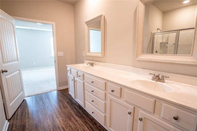 155 Sanctuary Pl, Jasper, GA 30107 - full bath featuring double vanity, wood finished floors, and an enclosed shower