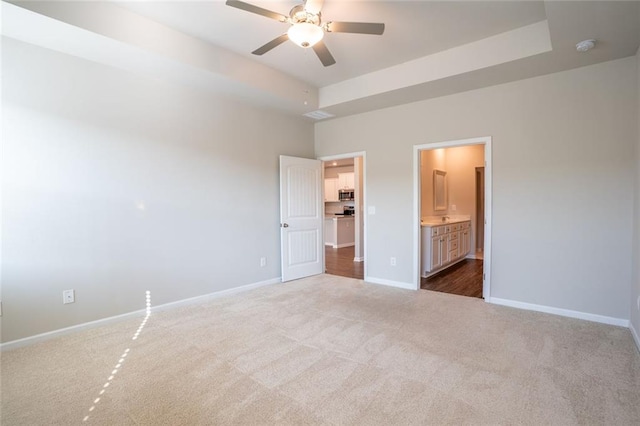 155 Sanctuary Pl, Jasper, GA 30107 - unfurnished bedroom featuring carpet floors, ensuite bathroom, a walk in closet, and ceiling fan
