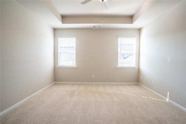 155 Sanctuary Pl, Jasper, GA 30107 - empty room with light colored carpet, a ceiling fan, and a tray ceiling