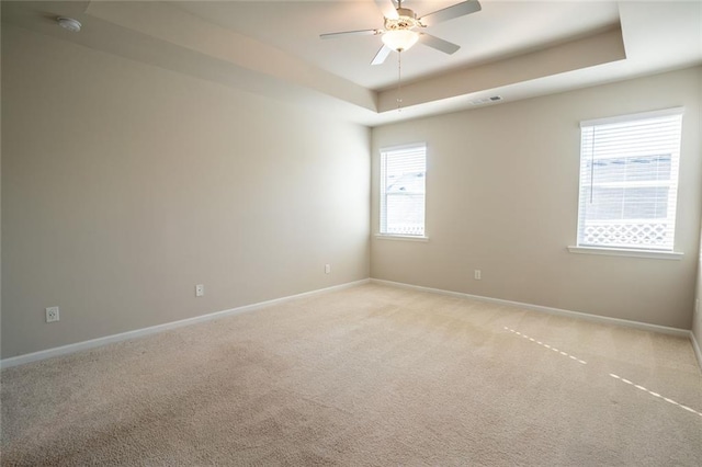 155 Sanctuary Pl, Jasper, GA 30107 - unfurnished room featuring a raised ceiling, a ceiling fan, light colored carpet, and a smoke detector