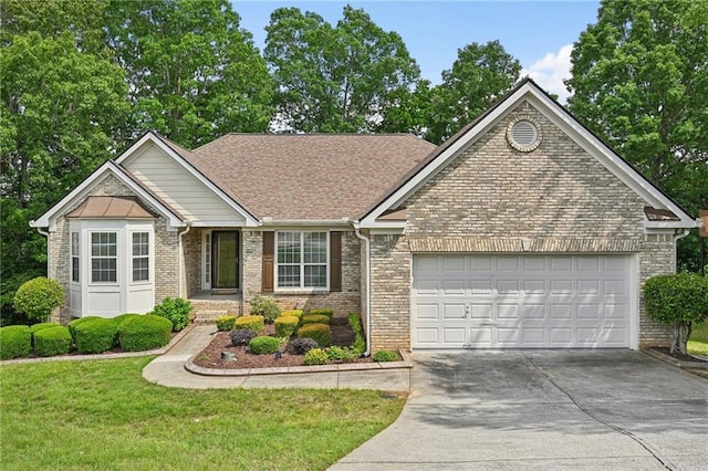 single story home featuring a garage, concrete driveway, brick siding, a front lawn, and a shingled roof