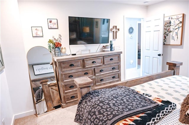 bedroom featuring baseboards