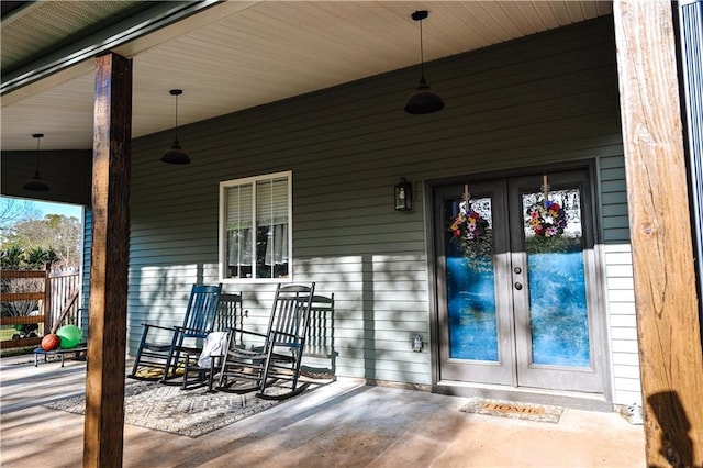 exterior space featuring french doors and covered porch
