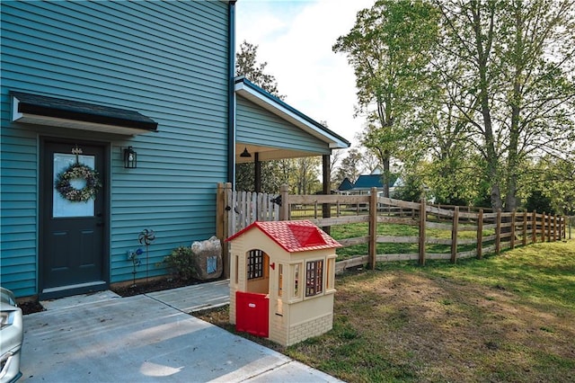 view of property exterior featuring fence