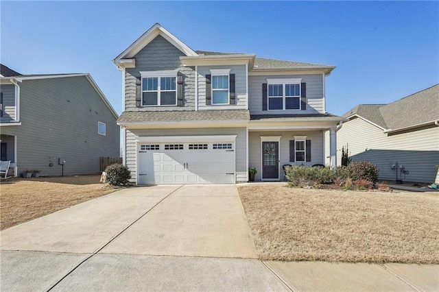 view of front of home with a garage