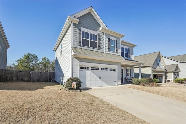 view of front of property with a garage