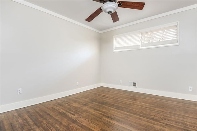 unfurnished room featuring a ceiling fan, baseboards, visible vents, dark wood finished floors, and ornamental molding