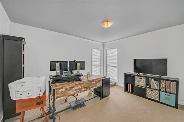 carpeted home office featuring ornamental molding