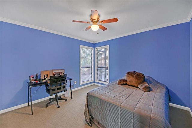 carpeted bedroom featuring crown molding and ceiling fan