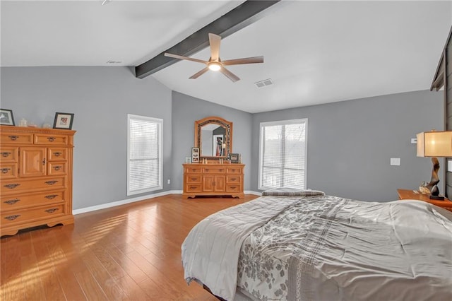 bedroom featuring lofted ceiling with beams, ceiling fan, and light hardwood / wood-style flooring