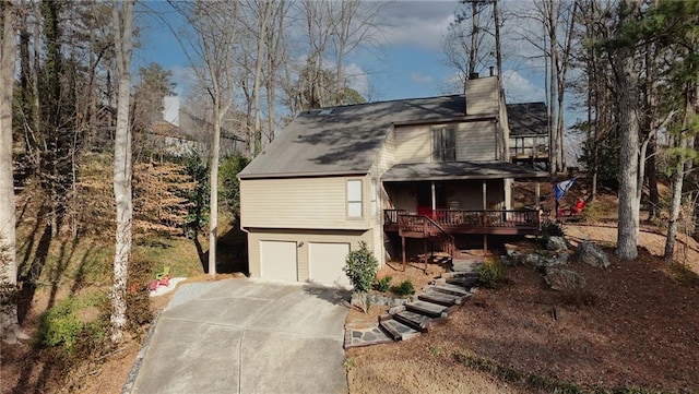 view of front of home featuring a garage and a porch