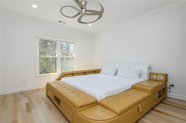 2461 Oak Grove Ests NE, Atlanta, GA 30345 - bedroom featuring crown molding, light wood-type flooring, baseboards, recessed lighting, and a ceiling fan