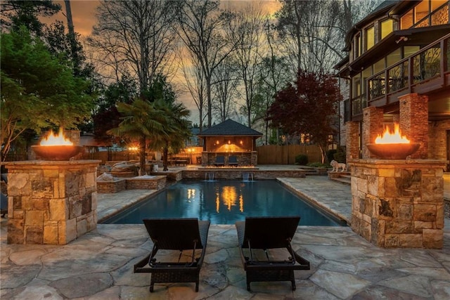 2461 Oak Grove Ests NE, Atlanta, GA 30345 - view of pool with a fireplace and a patio area