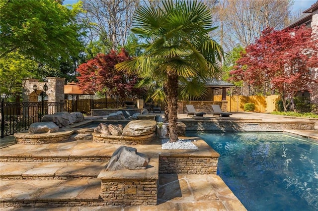 2461 Oak Grove Ests NE, Atlanta, GA 30345 - view of swimming pool with a fenced backyard and a patio area