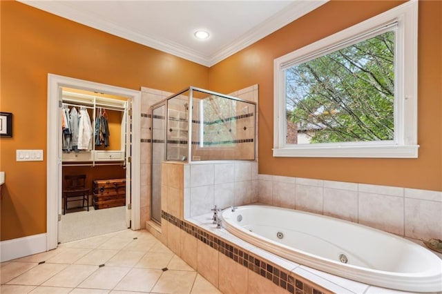 full bathroom with a shower stall, a jetted tub, a walk in closet, crown molding, and tile patterned floors
