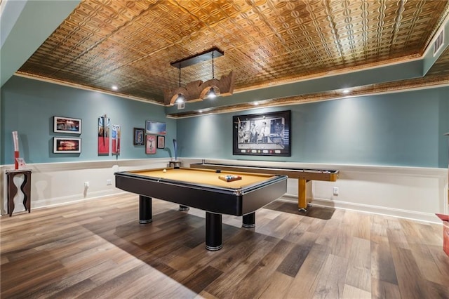 playroom with an ornate ceiling, ornamental molding, billiards, wood finished floors, and baseboards