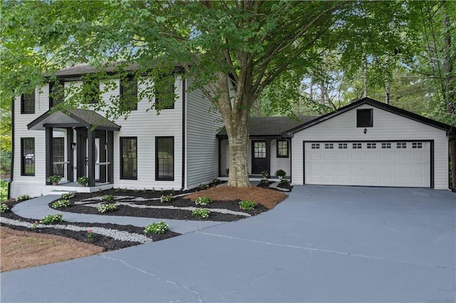 view of front of property with a garage