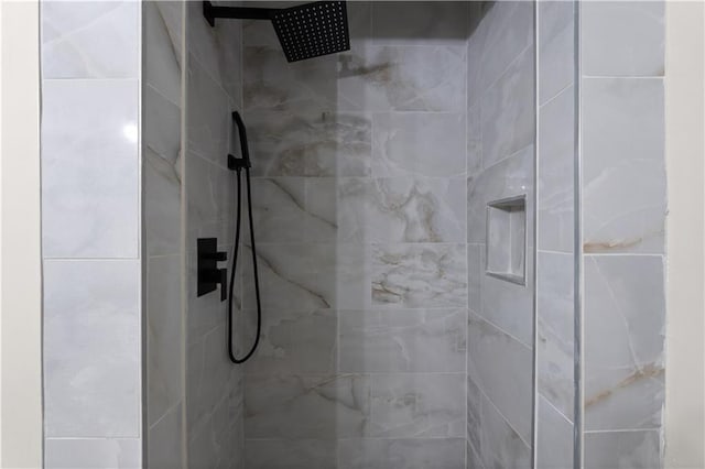 bathroom with a shower stall