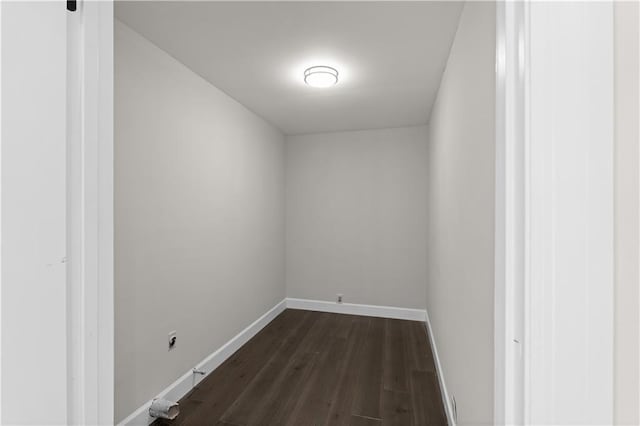 interior space featuring dark wood-style floors and baseboards