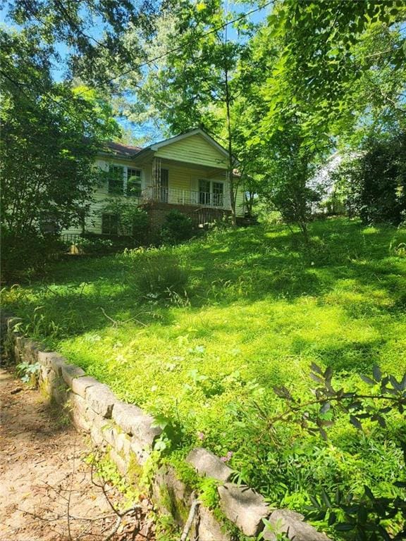 view of yard featuring a porch