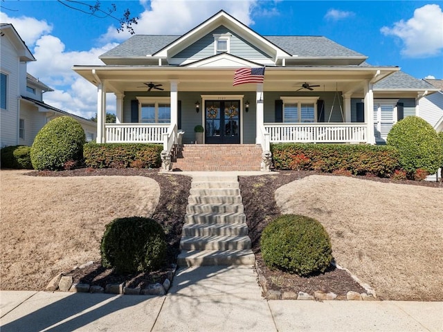 bungalow-style house featuring ceiling fan and a porch