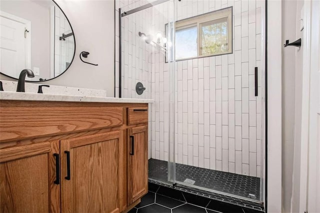 1336 Mcclelland Ave, Atlanta, GA 30344 - bathroom with a shower stall, vanity, and tile patterned flooring