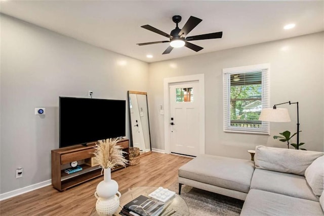 1336 Mcclelland Ave, Atlanta, GA 30344 - living area with light wood-style flooring, a ceiling fan, and recessed lighting