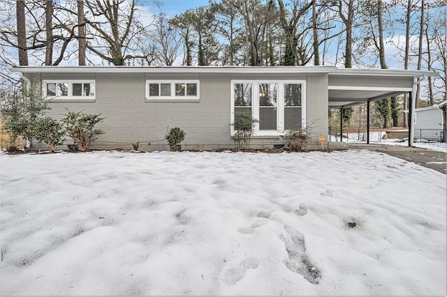 exterior space featuring a carport