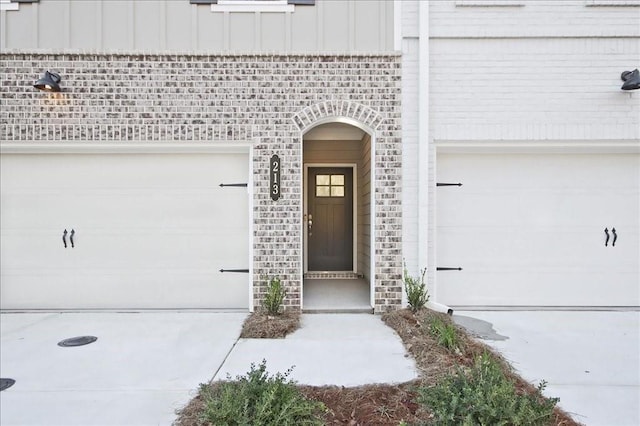 property entrance with a garage