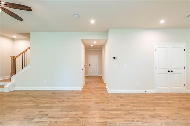 138 Henley St, Canton, GA 30114 - spare room featuring light wood-style flooring, ceiling fan, recessed lighting, baseboards, and stairway