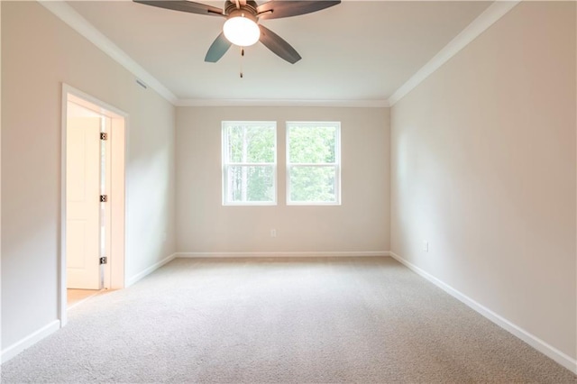138 Henley St, Canton, GA 30114 - spare room featuring light carpet, ornamental molding, baseboards, and a ceiling fan