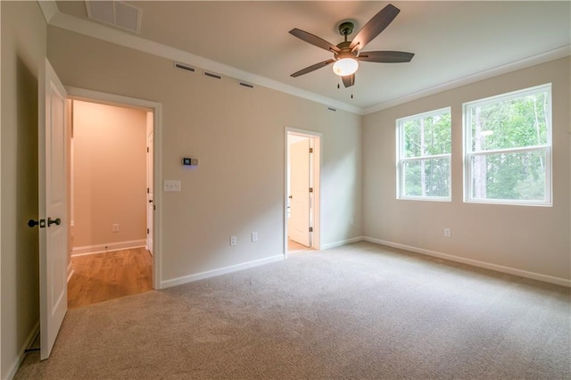 138 Henley St, Canton, GA 30114 - empty room with light carpet, a ceiling fan, baseboards, and ornamental molding