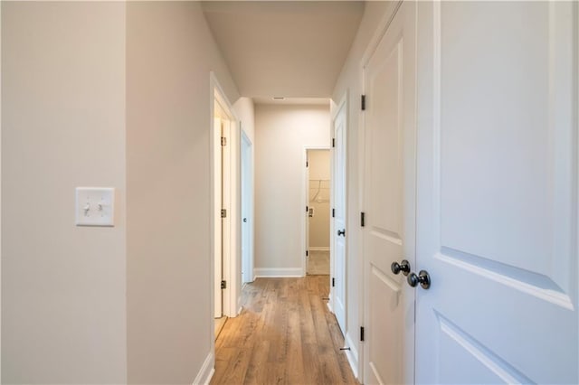 138 Henley St, Canton, GA 30114 - corridor featuring light wood-style floors and baseboards