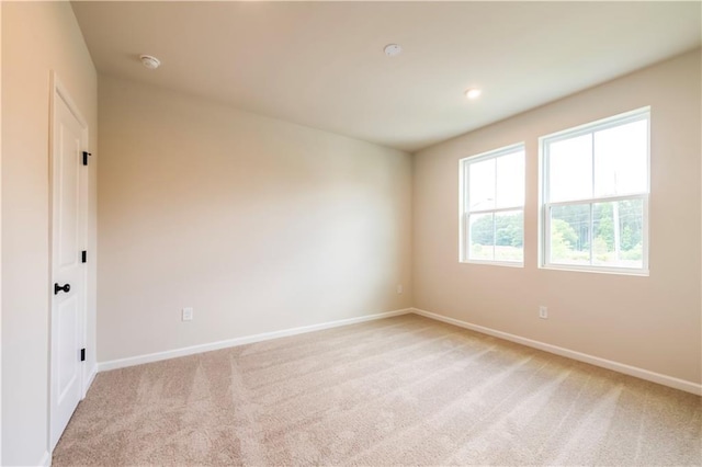 138 Henley St, Canton, GA 30114 - spare room featuring light colored carpet and baseboards