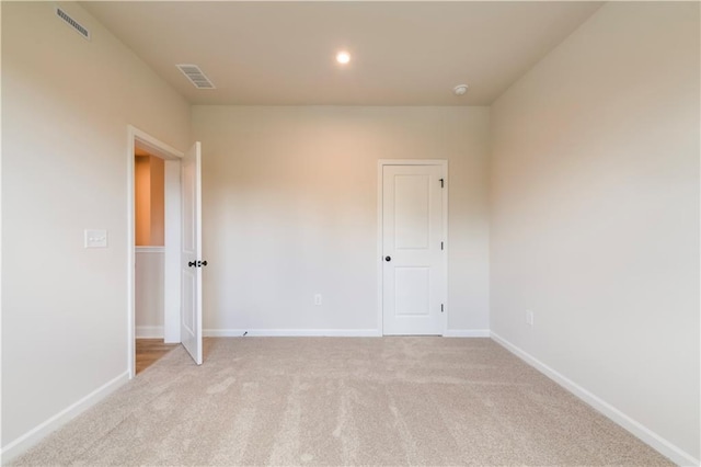 138 Henley St, Canton, GA 30114 - unfurnished room with light carpet, baseboards, and recessed lighting