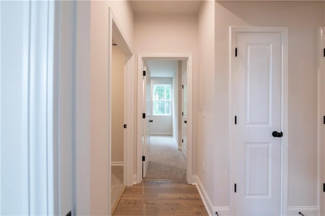 138 Henley St, Canton, GA 30114 - hall with baseboards and light wood finished floors