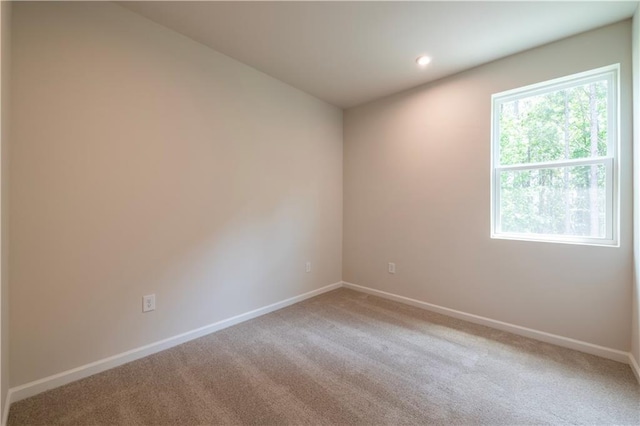138 Henley St, Canton, GA 30114 - carpeted empty room with baseboards and recessed lighting